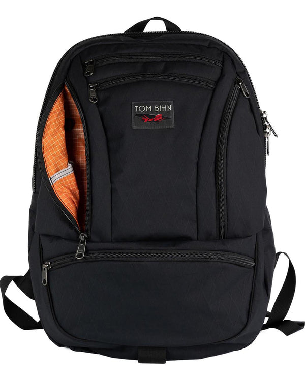 The Synapse 25 in Black X-Pac with a Zest (orange with white grid) 200 Halcyon interior